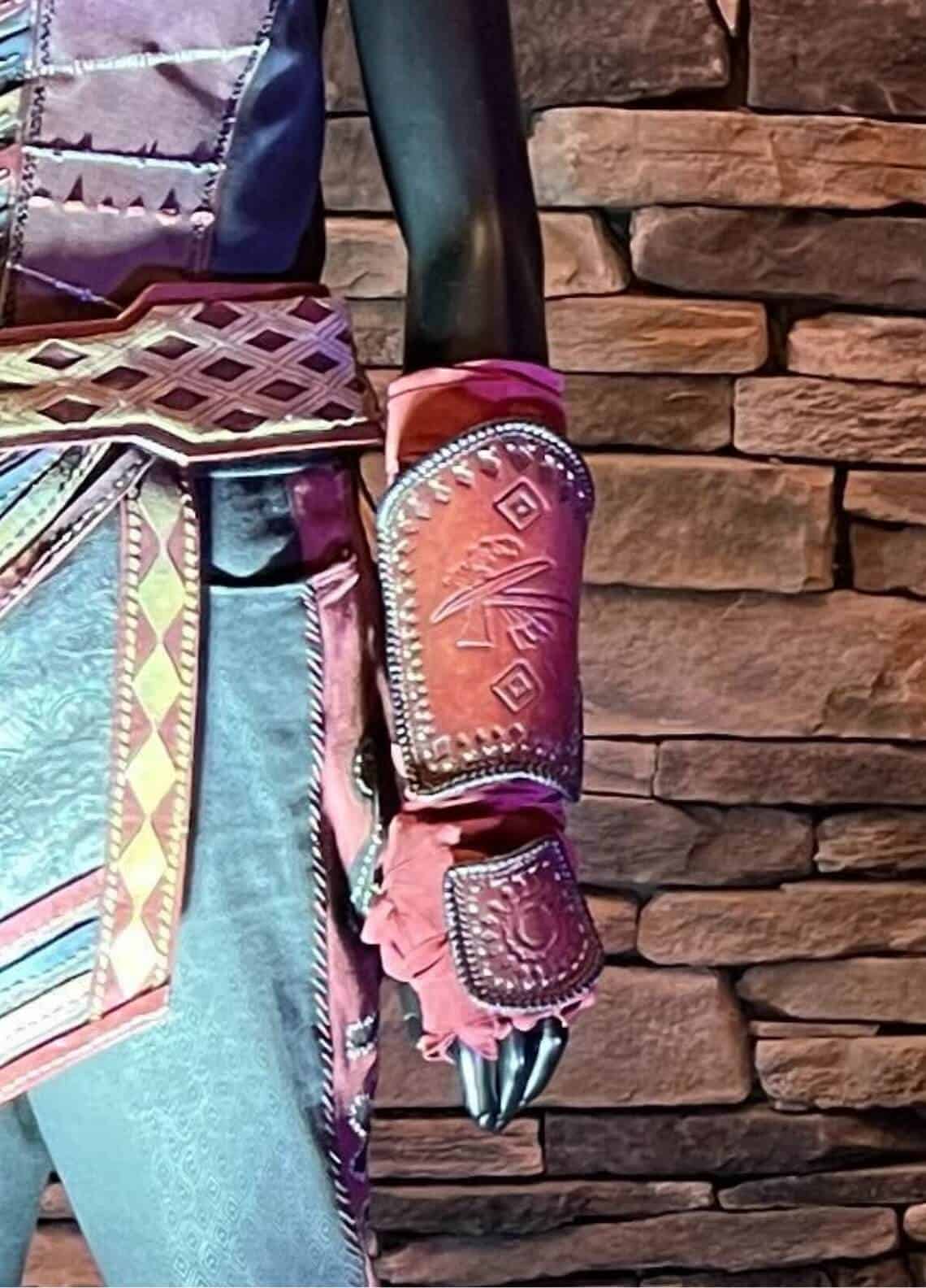 ECHO's armor with Great Seal of the Choctaw Nation of Oklahoma in the center of the wristguard