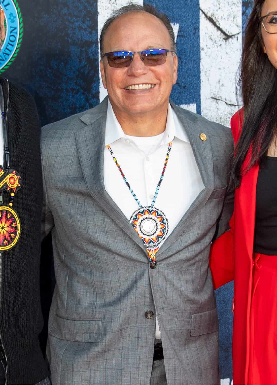 Chief Batton wears a Sun Symbol medallion